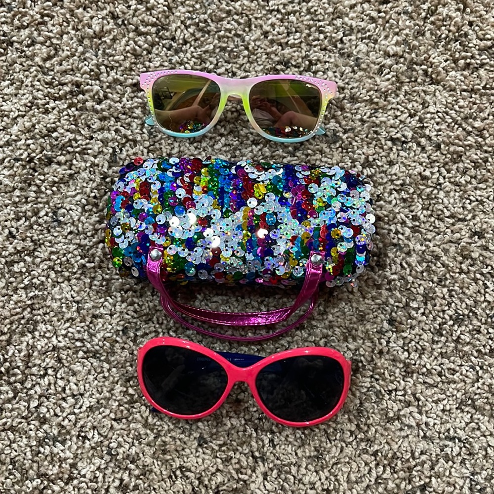 2 pair kids sunglasses and 1 case.